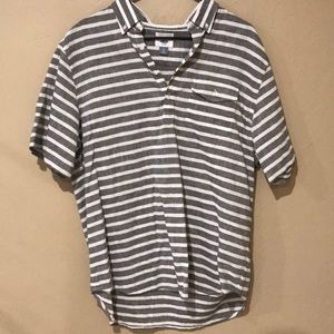 Striped short sleeve collared shirt.